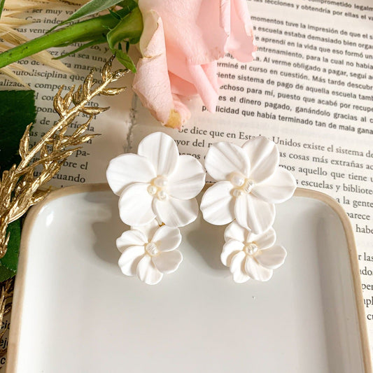 double flower dangle earrings in polymer clay and tiny pearls in the center