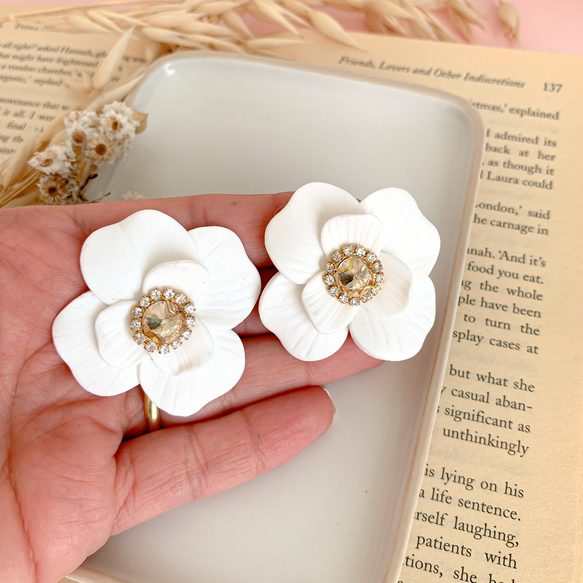 Hand-measured white flower statement earrings