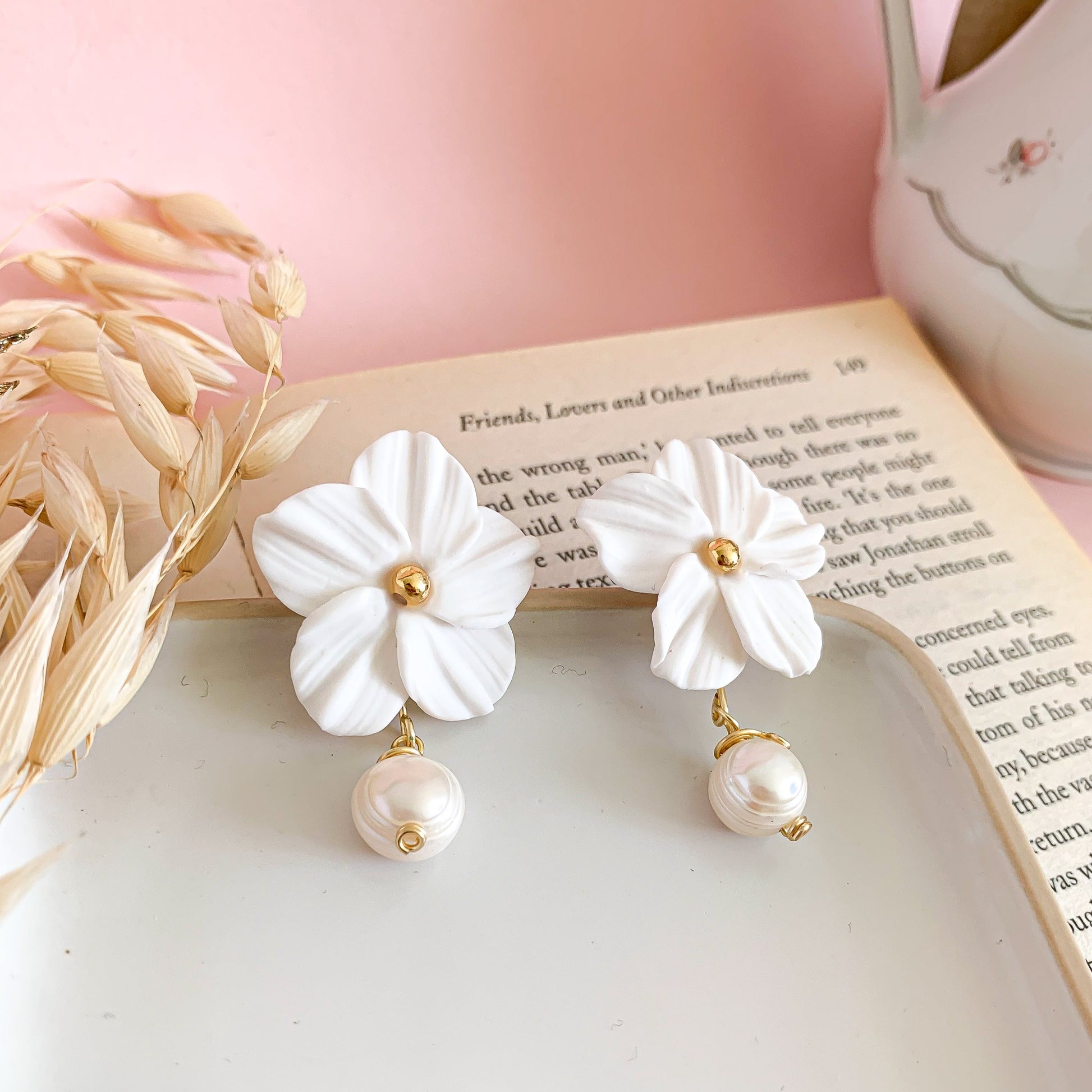 bridal floral dangly pearls earrings in clay