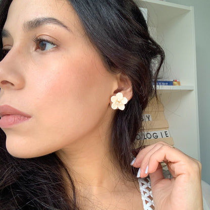 model with bridal floral earrings with pearls 