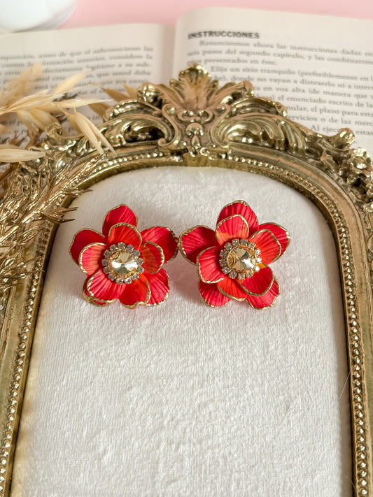 Rode bloemen oorbellen met crystal kralen in de midden