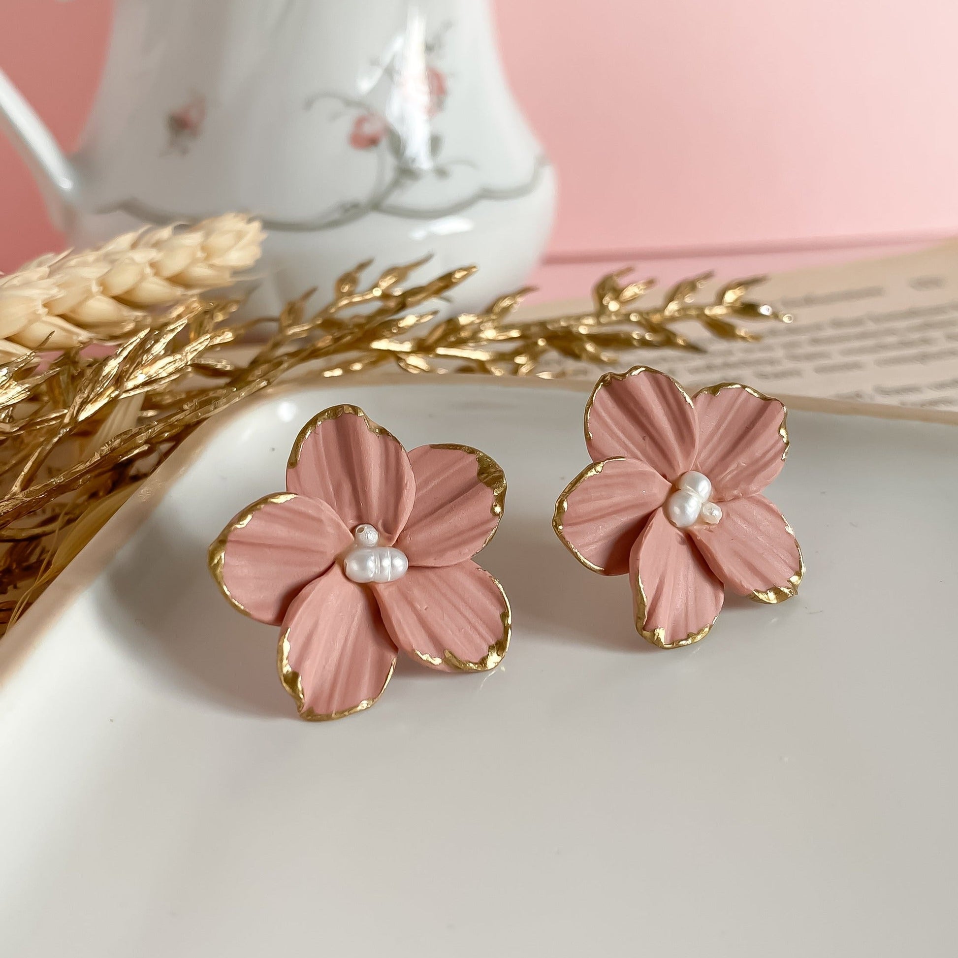 Blush pink flower stud earrings handmade in polymer clay